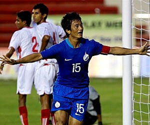 Baichung Bhutia celebrates after scoring the first goal against Sri Lanka in their Nehru Cup match in New Delhi on  Wednesday. (AP)