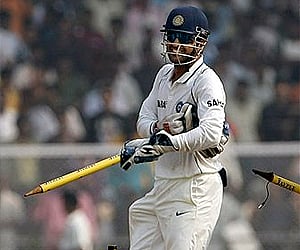 Mahendra Singh Dhoni celebrates after India won the third cricket test match against Sri Lanka. (Photo: AP)