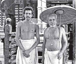 Gopalan Empranthiri, the main priest (right) and Manikantan Embranthiri, the assistant priest at the Sree Poornathrayeesha Temple