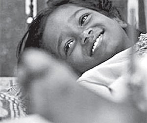 A file picture of Devika Rotawan, who was hit by a bullet during the Mumbai attacks, at a hospital.