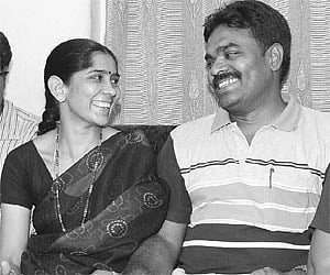 HAPPY MOMENT: JV Murali and his wife share a happy moment after he topped the Group I exams/Pic Rvk Rao.