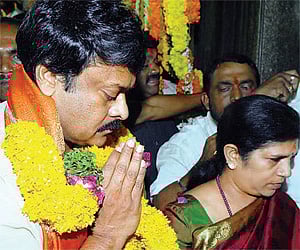 PRP president K Chiranjeevi and wife Surekha pray at the Sri Ujjaini Mahanakali temple on Sunday.