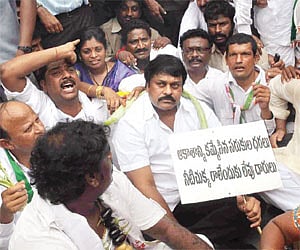 Praja Rajyam Party president K.Chiranjeevi and party members staging a dharna in front of the Chief Rationing Officer’s office in Hyderabad.