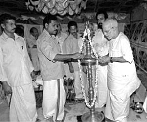 NSS general secretary P K Narayana Panicker inaugurating the Mallika Kizhaku Karayogam  building at Thattayil near Pandalam by lighting the traditiona