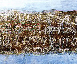 A portion of stone inscription at Periyanayaki Amman temple in Palani which mentions a solar eclipse during 17th century.