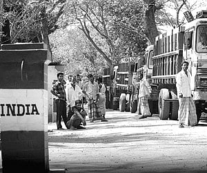 Bangladeshi trucks stand in a queue at Akhura check post in Agartala on Thursday in the wake of the rebellion by BDR in Bangladesh.