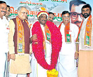 Newly-elected State BJP president Pon Radhakrishnan (third from left) along with other party leaders.
