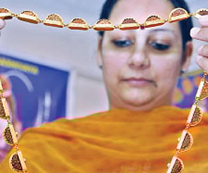 A visitor looking at the Srikanta mala at the the Rudraksha Exhibition-cum-Sale held at CP Art Centre in the city on Thursday.