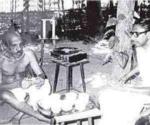 K P Achuthan with Basheer under the mangosteen tree.