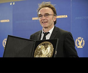 Danny Boyle poses with the award for feature film for "Slumdog Millionaire" backstage at the Directors Guild of America Awards on Saturday. (AP)