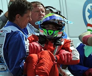 Ferrari's Felipe Massa is carried out of his car after his accident during the qualifying session at the Hungaroring near Budapest, Hungary. (AP)
