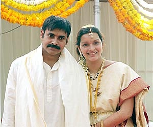 Actor Pawan Kalyan and his wife Renu Desai greeting fans after getting married at their Residence in Hyderabad on Wednesday.