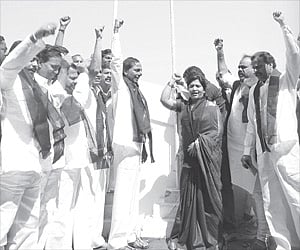 TRS president K Chandrasekhar Rao hoisting a black flag at Telangana Bhavan in Hyderabad on Sunday.
