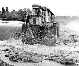 The bank of the Moolathara dam (regulator-cum-bridge) which breached following the release of water from the Aliyar dam.
