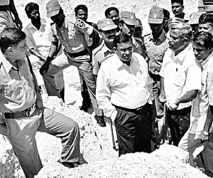District collector T Abraham (centre) and others inspecting fossils on Wednesday in the Ninniyur channel at Ariyalur.