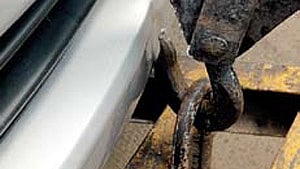 Image of a car being towed used for representational purpose only.