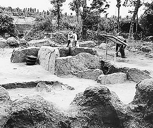 A stone-bunker and other artefacts that were unearthed at Chinna Gandhipuram near Palani recently.