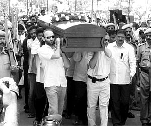 Bidding Farewell: Manchu Ferrer lends a shoulder to the pall-bearers at the final journey of his father, Spanish humanist Father Vincent Ferrer, in An