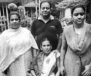 Sultana Begum (sitting), the great grand daughter-in-law of India’s last Mughal Emperor Bahadur Shah Zafar, along with her family members in Kolkata