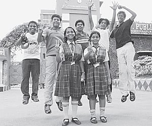 Ananya Das (front right) flashes victory sign as students of DAV Public School CS Pur celebrate their success in the CBSE-X examination in Bhubaneswar