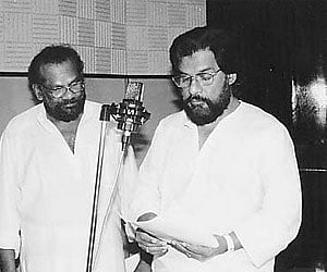 Raveendran Master with Yesudas during a recording session.