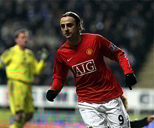 Manchester United's Dimitar Berbatov celebrates his goal against Newcastle United. (Photo: AP)