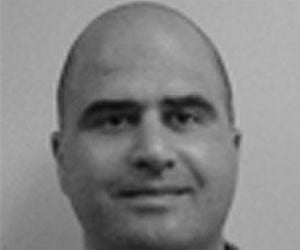 This photo from the Center for the Study of Traumatic Stress Web Site shows Nidal Malik Hasan. AP