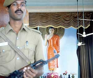 A securityman guarding the Maha Bodhi Society Temple in Egmore.