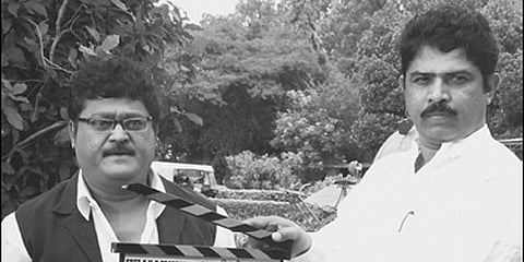 Minister for Transport R Ashok sounding the clap board on Jaggesh at Sri Kanteerava Studios: ENS