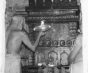 Priests performing poojas at the newly-opened Mantralayam temple in Kurnool district on Monday.