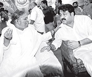 Mohanlal sharing a light moment with Mata Amritanandamayi at the function to celebrate the birthday of the Mata at Amritapuri in Kollam on Saturday.