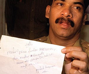 Vijaya Vani's suicide letter being displayed.