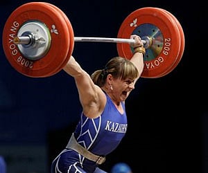 Svetlana Podobedova strains in the snatch of the women's group A 75-kilogram category of the World Weightlifting Championships in Goyang. (AP)