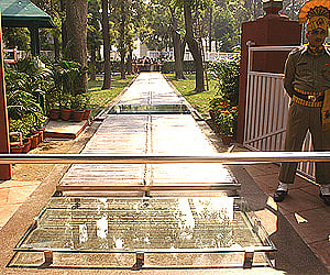 The crystal pathway where Indira Gandhi walked her last steps on Oct 31, 1984. The spot where she fell is marked by a sheet of plain glass. (IANS)