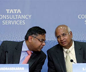 S. Ramadorai speaks to N. Chandrasekaran during a news conference in Mumbai. (Reuters)