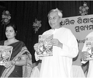 Chief Minister Naveen Patnaik releasing the new version of Sishulekha.