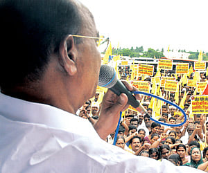 PMK founder leader Dr S Ramadoss addressing a protest demonstration seeking exclusive quota for Vanniyars, in the city on Wednesday. ENS