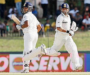 Sachin and Raina run between the wickets during the third day of the second test cricket match between India and Sri Lanka in Colombo. (AP)