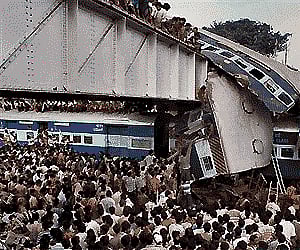 Local residents and rescue workers gather at the site of an accident at Sainthia station, about 125 miles (200 kilometers) north of Calcutta. AP