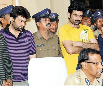 Drug peddling suspects Cheema Clement (left), Raghunath Raju and Bharat Raju being presented before the media by Police Commissioner AK Khan on Friday