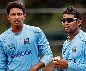 Tillakaratne Dilshan and Suraj Randiv look on during a practice session for the tri-nation cricket series in Dambulla on Wednesday, Aug. 18, 2010.(AP)
