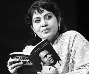 Actress Padma Vasanthi going through the book ‘Puttanna Kanagal- The Artistic Vision of a Popular Film Maker’ | EPS