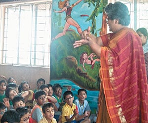 The students of Class 2 and 3 of Calibre Academy with Sandhya Rao during the storytelling and poetry reading session at the school | EPS