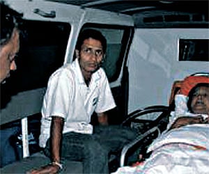 Parvathy Vellupillai (on the stretcher), the paralysed mother of Prabhakaran, being taken in an ambulence to Valvattithurai from Colombo on Saturday