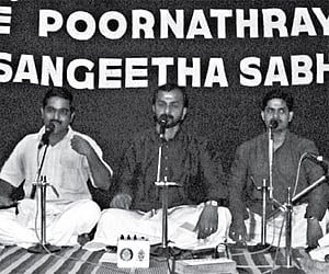 The jugalbandi of kathakali sangetham and carnatic vocal being presented by Kottakal Madhu, Nedumpilly Ram Mohan and Dileep Kumar at Kalikotta Palace