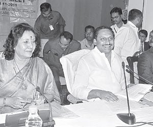 Chief minister N Kiran Kumar Reddy giving pension certificate to a woman during the Rachabanda programme in Gangavaram mandal of Chittoor on Tuesday.