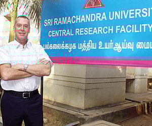 POSE FOR A CAUSE: Students of Seva Sangam Girls Higher Secondary School in Tiruchy form a red ribbon logo on the eve of World AIDS Day on Wednesday.
