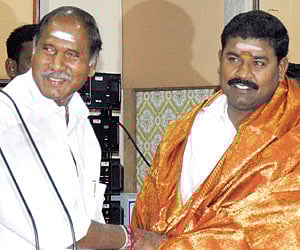 Chief Minister N Rangasamy greeting TPR Selvam, who assumed charge as Deputy Speaker on Wednesday.