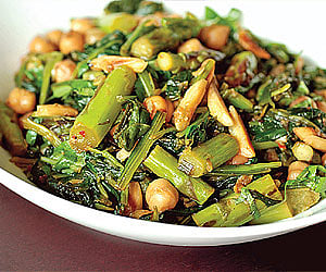 Stir fry exotic vegetables with raw mango puree and peanut butter