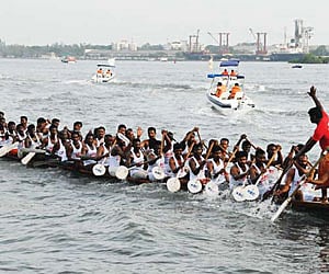 A snakeboat being rowed in the backwaters of Kochi, in connection with the launch of the high-speed patrol boats for the city police on Friday.